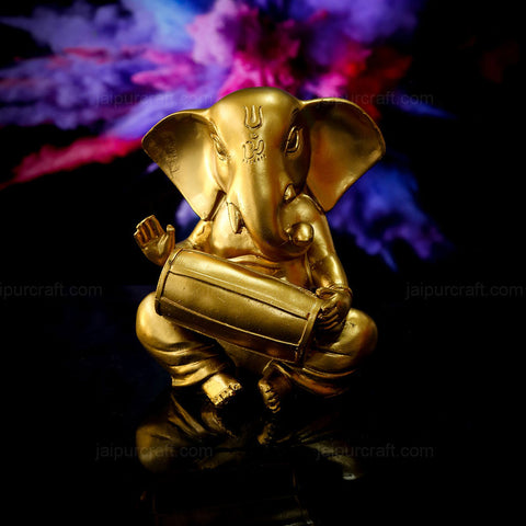 dholak-playing-lord-ganesha-statue-gold-color