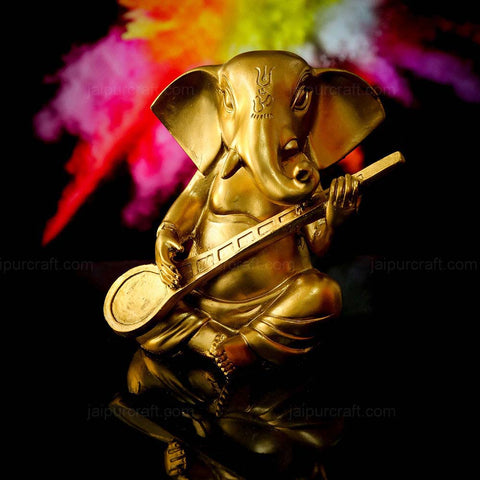 sitar playing lord ganesha statue gold finish