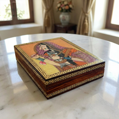 Decorative wooden box with intricate gemstone painting